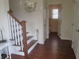 Stairs and railings can be custom designed and include hardwood to match the floors.