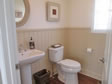 Notice the beautiful Wainscoting and comfort height toilets in this modular home.